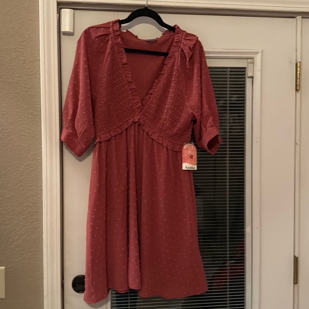 Never Worn Dress
Size XL or X with Arula